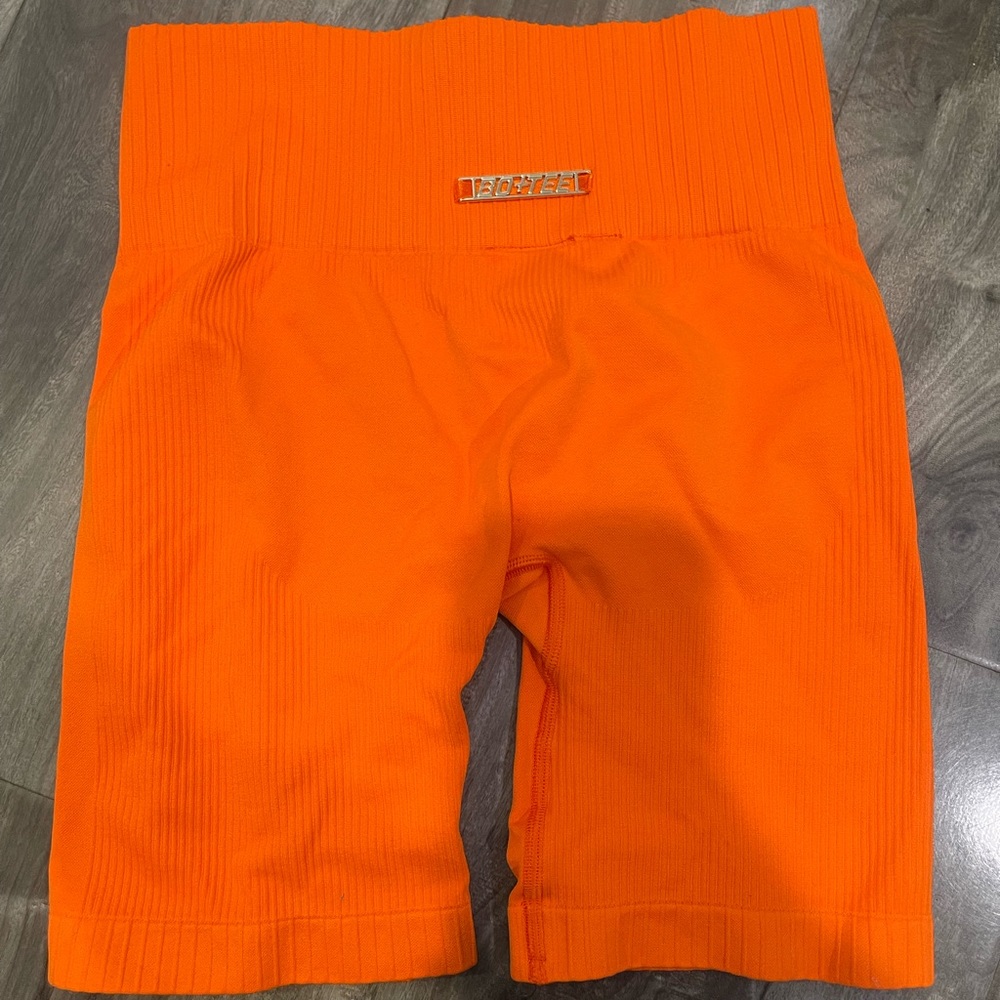 Bo + Tee orange athletic shorts